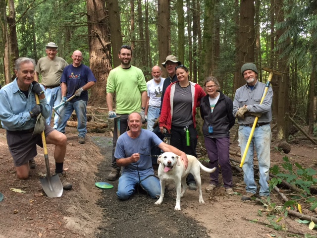 Trail building crew plus dog